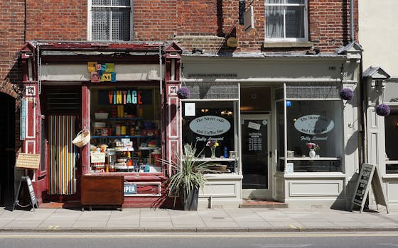 Vintage shop and cafe in Norwich showcasing eclectic storefronts and vibrant signage.
